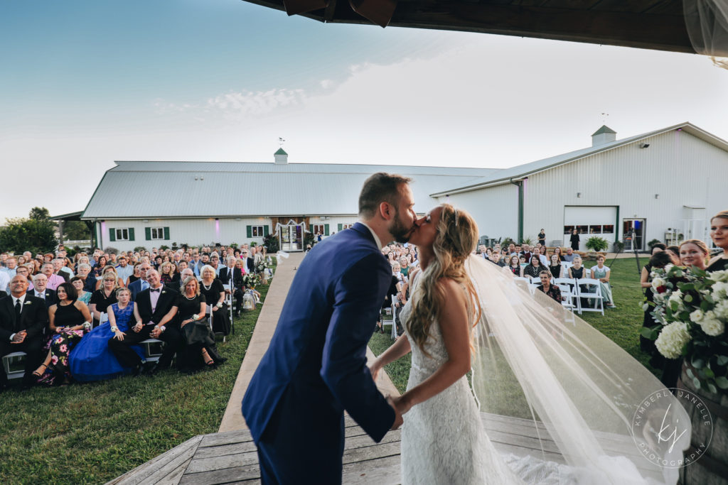 bride groom kissing fun picture